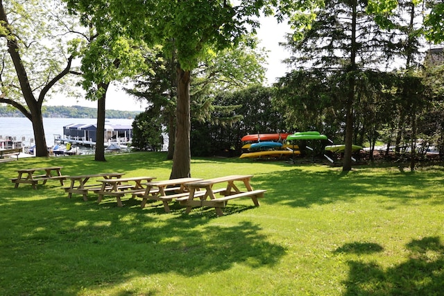 N2335 Main Rd, Lake Geneva, WI 53147 - view of property's community featuring a water view and a yard