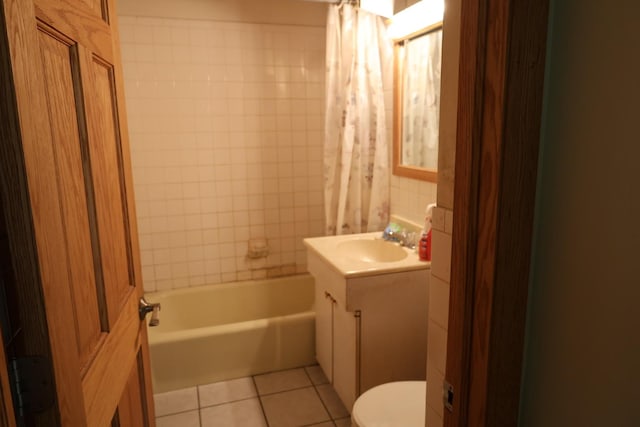 N2335 Main Rd, Lake Geneva, WI 53147 - bathroom with vanity, tile patterned flooring, toilet, and shower / tub combo
