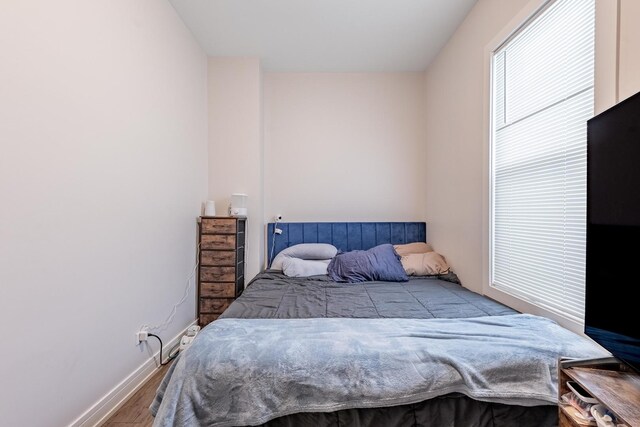 3331 S Ashland Ave, Chicago, IL 60608 - bedroom with wood finished floors and baseboards
