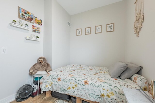 3331 S Ashland Ave, Chicago, IL 60608 - bedroom with wood finished floors and baseboards