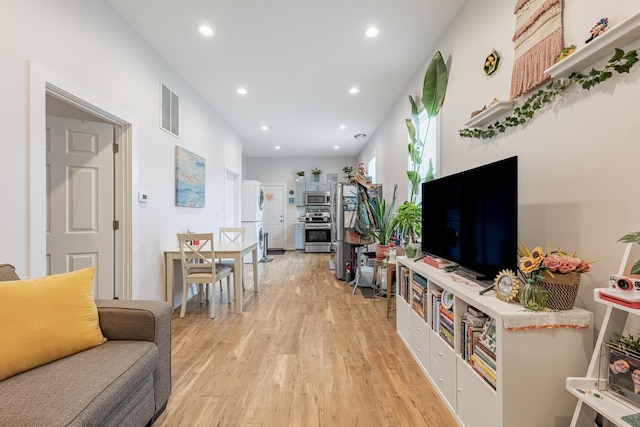 3331 S Ashland Ave, Chicago, IL 60608 - living area featuring light wood-style flooring and recessed lighting