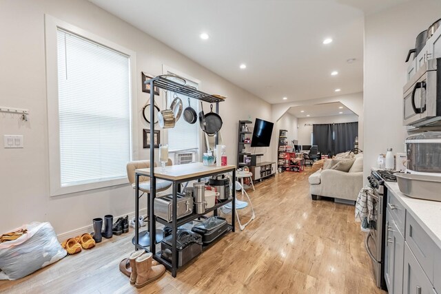 3331 S Ashland Ave, Chicago, IL 60608 - interior space with light wood-style flooring, recessed lighting, arched walkways, and baseboards