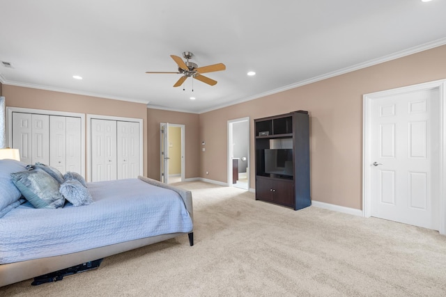 6972 W Imlay St, Chicago, IL 60631 - bedroom featuring multiple closets, light colored carpet, recessed lighting, crown molding, and connected bathroom