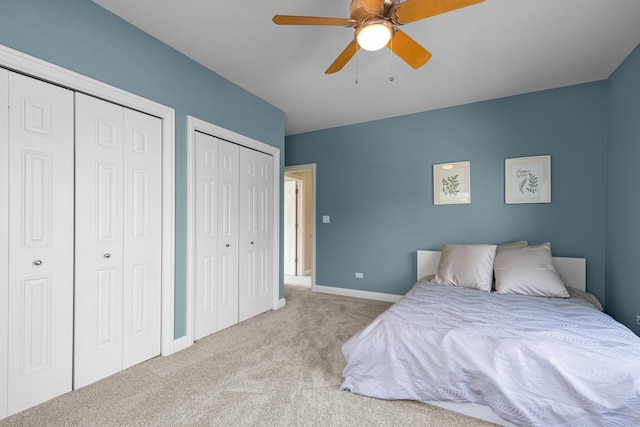 6972 W Imlay St, Chicago, IL 60631 - carpeted bedroom featuring two closets and ceiling fan