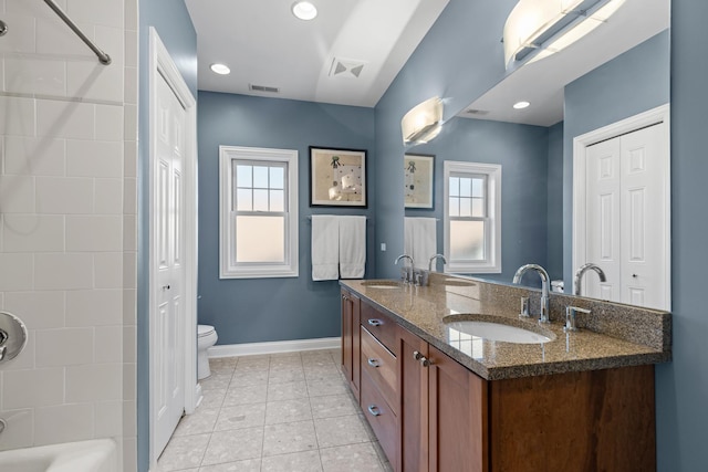 6972 W Imlay St, Chicago, IL 60631 - bathroom featuring double vanity, plenty of natural light, washtub / shower combination, and tile patterned flooring
