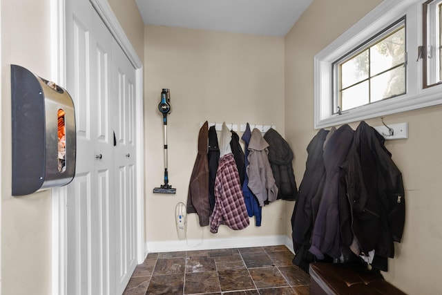 6972 W Imlay St, Chicago, IL 60631 - mudroom with baseboards and dark stone finish flooring