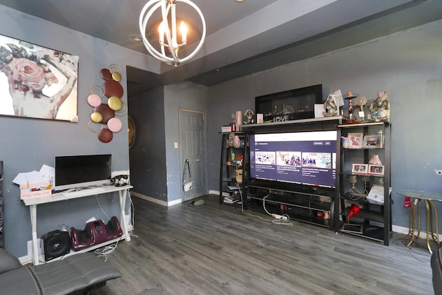 727 N Springfield Ave, Chicago, IL 60624 - living area featuring a chandelier, wood finished floors, and baseboards