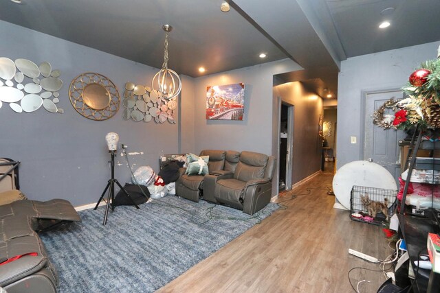 727 N Springfield Ave, Chicago, IL 60624 - living area featuring wood finished floors, a chandelier, and recessed lighting