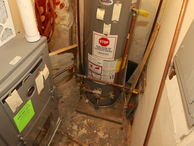 727 N Springfield Ave, Chicago, IL 60624 - utility room featuring water heater and heating unit