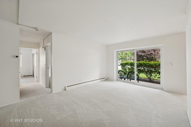 801 E Miner St Unit 1A, Arlington Heights, IL 60004 - carpeted spare room featuring baseboard heating and a smoke detector