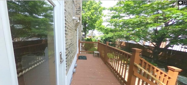 741 N Christiana Ave, Chicago, IL 60624 - view of wooden balcony featuring a wooden deck