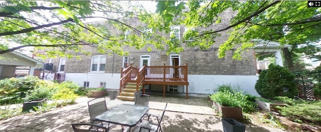 741 N Christiana Ave, Chicago, IL 60624 - rear view of property with a patio area, brick siding, and outdoor dining area