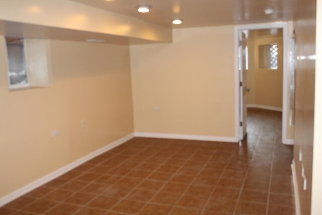 741 N Christiana Ave, Chicago, IL 60624 - finished basement featuring baseboards, tile patterned floors, and recessed lighting