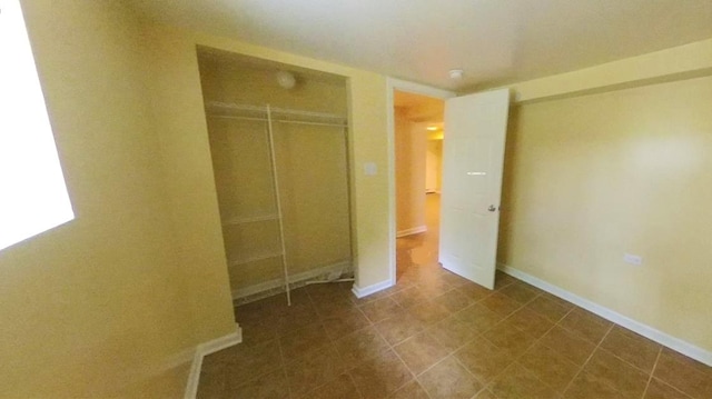 741 N Christiana Ave, Chicago, IL 60624 - unfurnished bedroom with a closet and baseboards