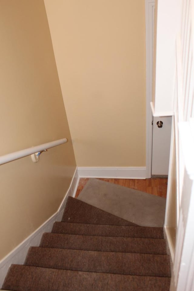 741 N Christiana Ave, Chicago, IL 60624 - stairs featuring baseboards