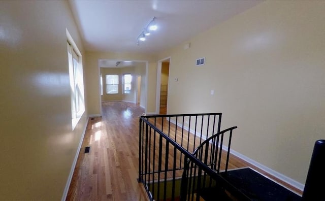 741 N Christiana Ave, Chicago, IL 60624 - hallway with an upstairs landing and wood finished floors