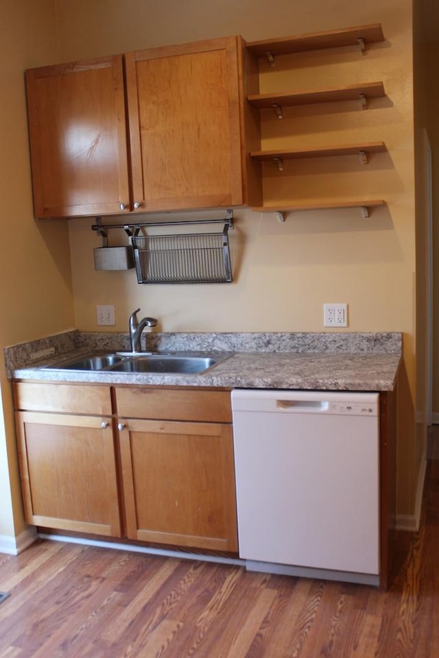741 N Christiana Ave, Chicago, IL 60624 - kitchen featuring dishwasher, a sink, wood finished floors, open shelves, and baseboards