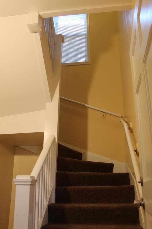 741 N Christiana Ave, Chicago, IL 60624 - staircase with baseboards