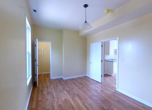741 N Christiana Ave, Chicago, IL 60624 - unfurnished room with wood finished floors