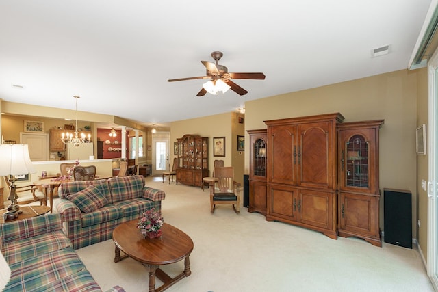 13391 Crestview Dr, Huntley, IL 60142 - living area featuring light carpet, a chandelier, and a ceiling fan