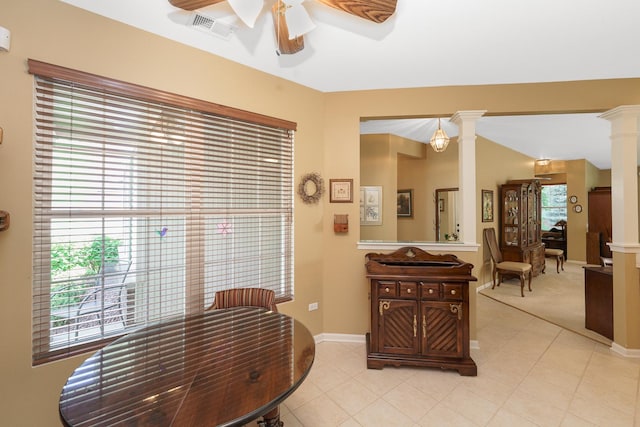 13391 Crestview Dr, Huntley, IL 60142 - dining space with ornate columns, a ceiling fan, and light tile patterned floors