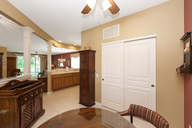 13391 Crestview Dr, Huntley, IL 60142 - kitchen featuring a ceiling fan, ornate columns, recessed lighting, light countertops, and light tile patterned floors