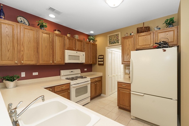 13391 Crestview Dr, Huntley, IL 60142 - kitchen with white appliances, light countertops, light tile patterned floors, and recessed lighting