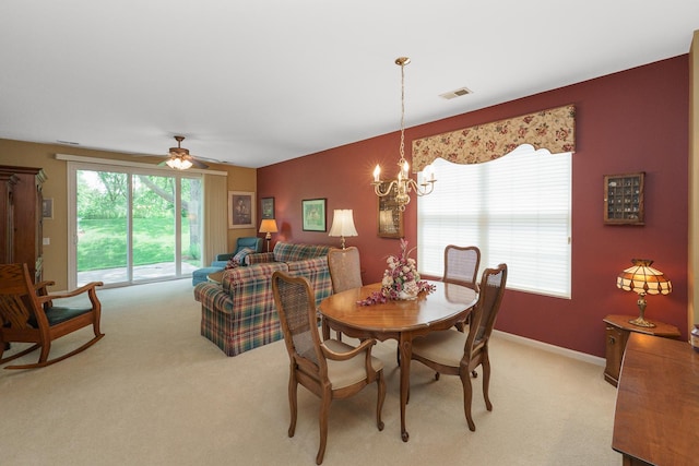 13391 Crestview Dr, Huntley, IL 60142 - dining room with light carpet, a chandelier, and a ceiling fan