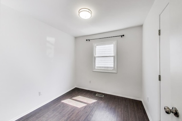 3505 Newcastle Rd, Waukegan, IL 60087 - spare room with dark wood-type flooring and baseboards