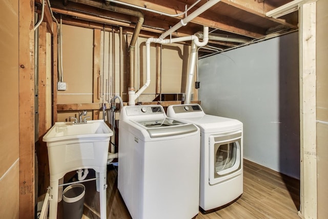 3505 Newcastle Rd, Waukegan, IL 60087 - washroom with washing machine and dryer and light wood-style floors