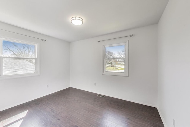 3505 Newcastle Rd, Waukegan, IL 60087 - empty room with dark wood finished floors and baseboards