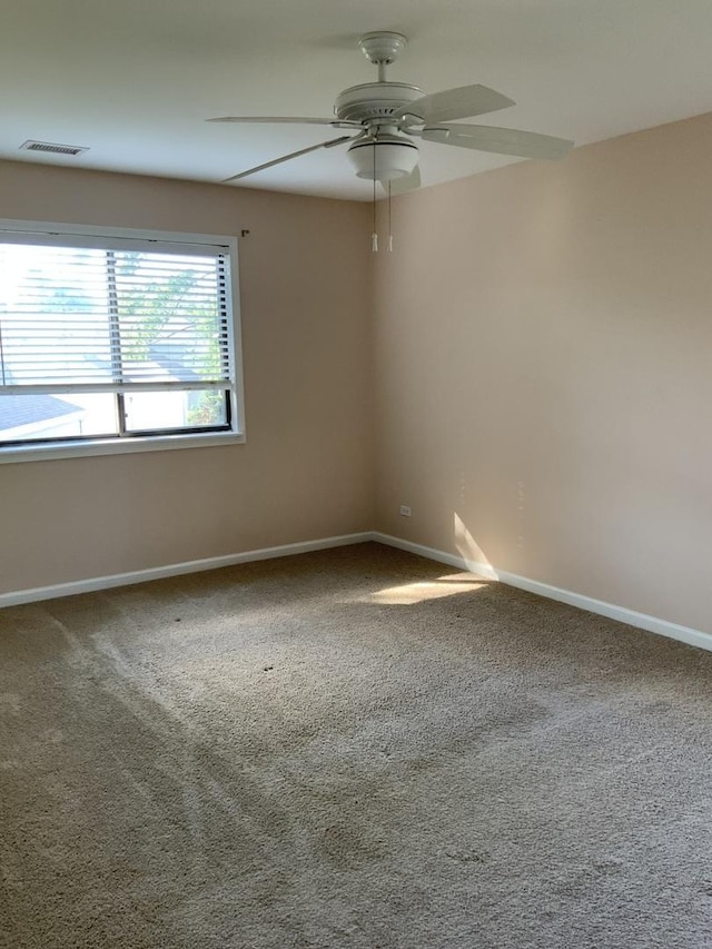 300 Pembridge Ln Unit D2, Schaumburg, IL 60193 - empty room with a ceiling fan and carpet floors
