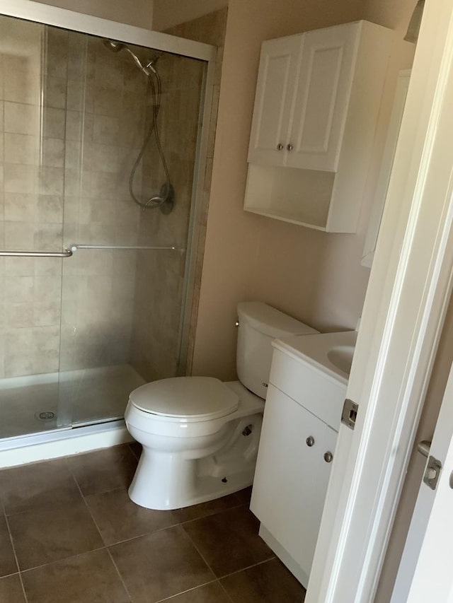 300 Pembridge Ln Unit D2, Schaumburg, IL 60193 - bathroom with vanity, a shower stall, and tile patterned flooring