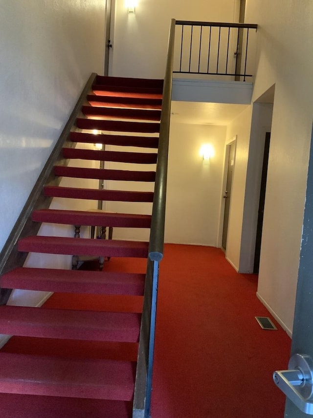 300 Pembridge Ln Unit D2, Schaumburg, IL 60193 - staircase with carpet flooring