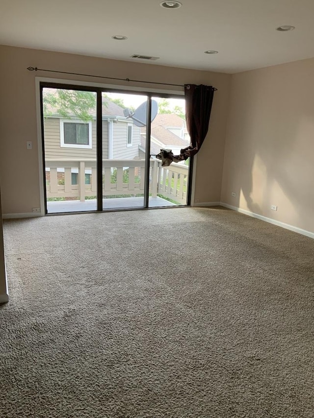300 Pembridge Ln Unit D2, Schaumburg, IL 60193 - empty room featuring carpet floors and recessed lighting