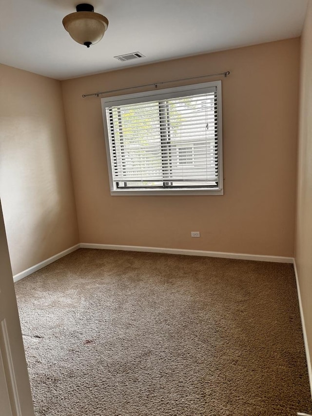 300 Pembridge Ln Unit D2, Schaumburg, IL 60193 - spare room with carpet and baseboards