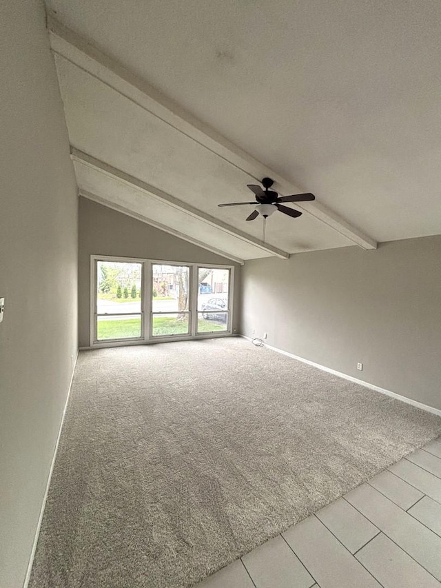 1403 Kings Rd, Carpentersville, IL 60110 - tiled spare room featuring a ceiling fan, carpet, and baseboards