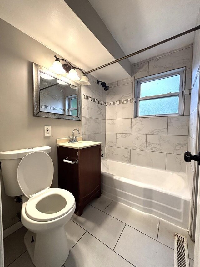 1403 Kings Rd, Carpentersville, IL 60110 - bathroom featuring shower / washtub combination, vanity, toilet, and tile patterned flooring