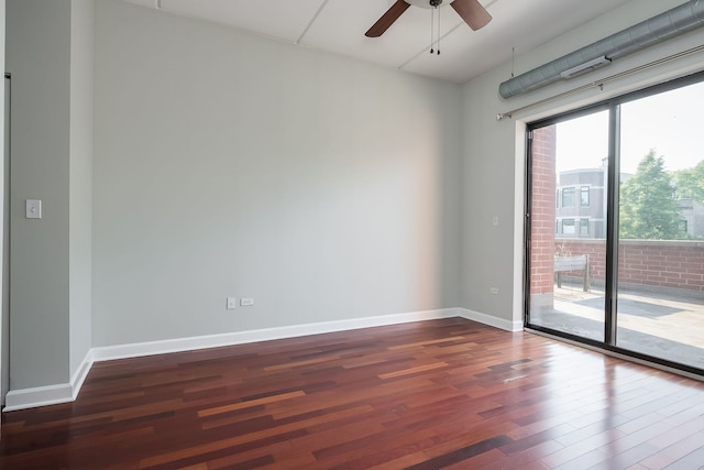 3125 W Fullerton Ave Unit 214, Chicago, IL 60647 - spare room with dark wood-style flooring and a ceiling fan