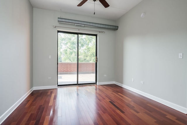 3125 W Fullerton Ave Unit 214, Chicago, IL 60647 - spare room with a ceiling fan and dark wood-type flooring