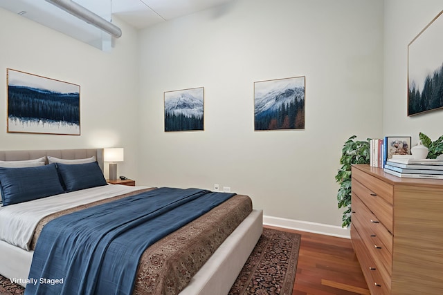 3125 W Fullerton Ave Unit 214, Chicago, IL 60647 - bedroom featuring wood finished floors and baseboards