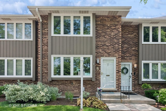 313 N Hale St, Wheaton, IL 60187 - view of front of house featuring brick siding and board and batten siding