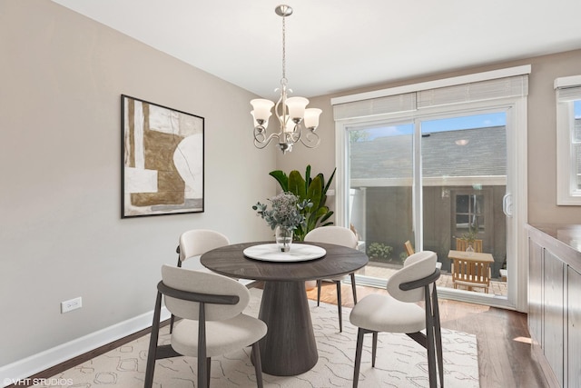 313 N Hale St, Wheaton, IL 60187 - dining space with wood finished floors and a chandelier