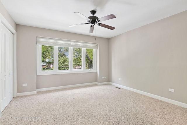 313 N Hale St, Wheaton, IL 60187 - unfurnished bedroom with carpet flooring, a closet, and a ceiling fan