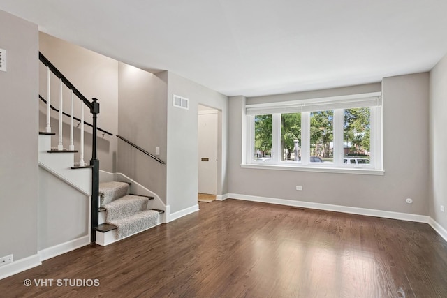 313 N Hale St, Wheaton, IL 60187 - unfurnished living room with wood finished floors and stairway