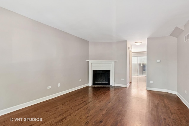 313 N Hale St, Wheaton, IL 60187 - unfurnished living room featuring dark wood-style floors and a tile fireplace