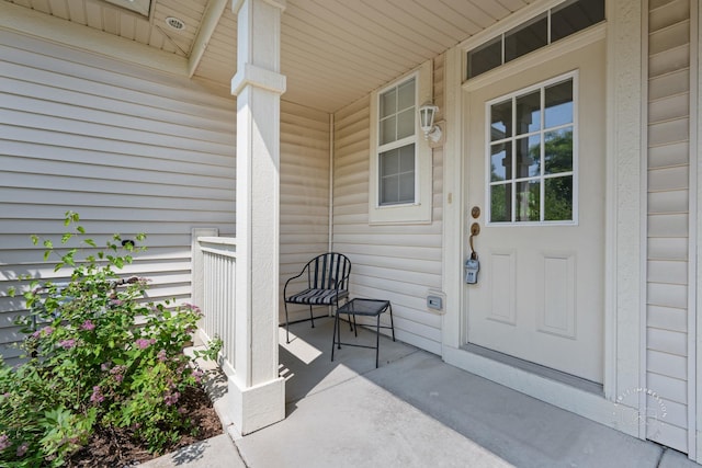 2049 Sunrise Cir, Aurora, IL 60503 - view of exterior entry with a porch