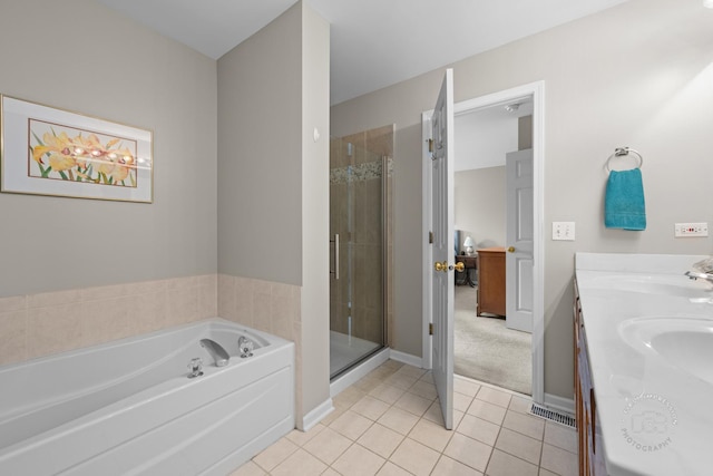 2049 Sunrise Cir, Aurora, IL 60503 - bathroom featuring tile patterned floors, a bath, a stall shower, and double vanity
