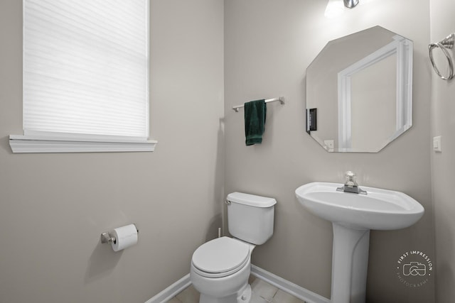 2049 Sunrise Cir, Aurora, IL 60503 - bathroom featuring toilet and tile patterned flooring