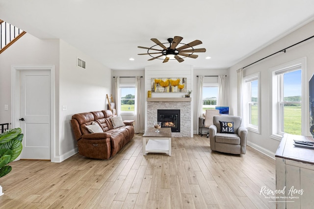 1405 Navajo Ct, Kankakee, IL 60901 - living area featuring light wood-type flooring, ceiling fan, baseboards, a fireplace, and recessed lighting